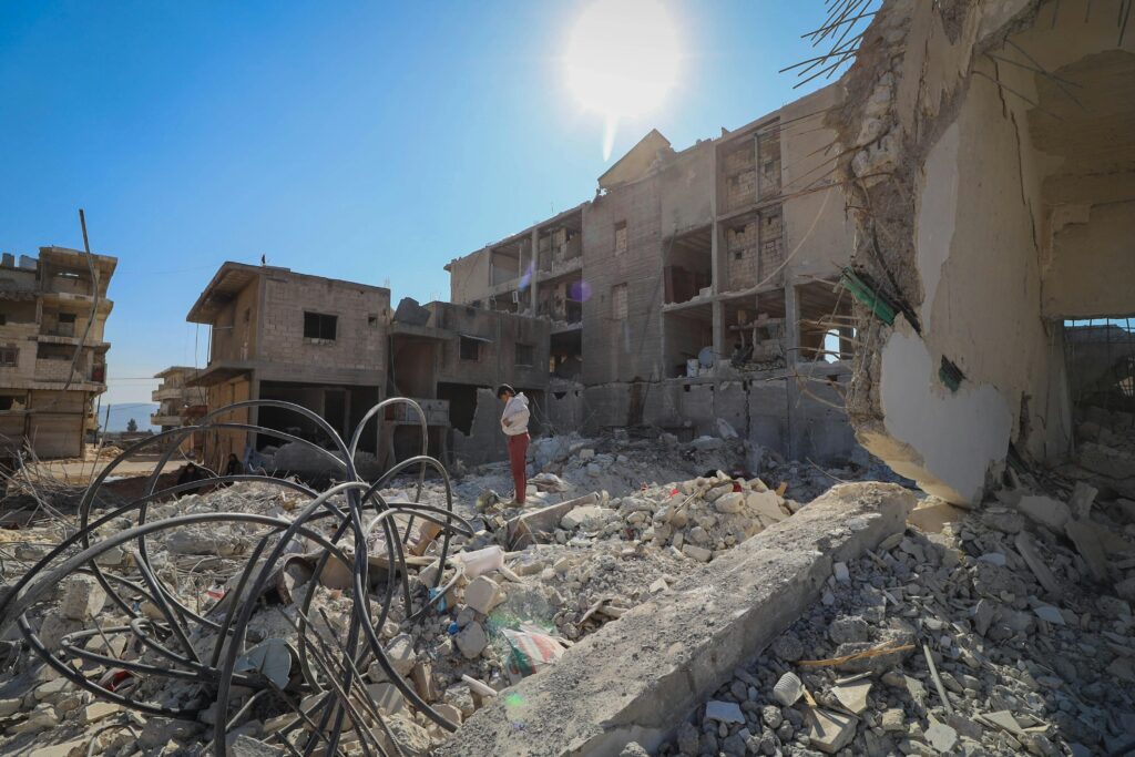A destroyed urban area in Idlib, Syria depicting the aftermath of conflict and devastation.
